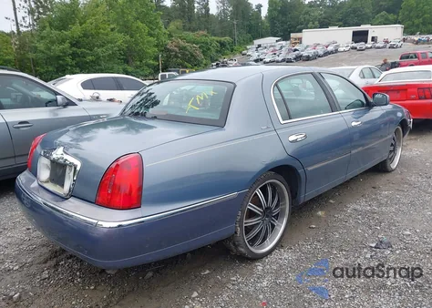 1999 Lincoln Town Car Executive из США, поврежденный, VIN 1LNHM81W0XY718096